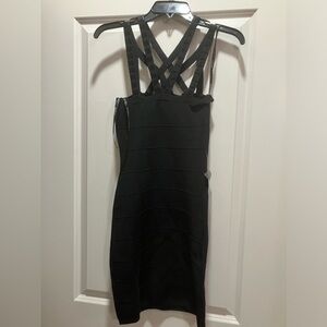 Bebe dress with beaded straps.  Size-M.  Color-black.  New with tags